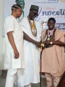 The chairman Ede South LG. Hon Lukman Afolabi and the president.