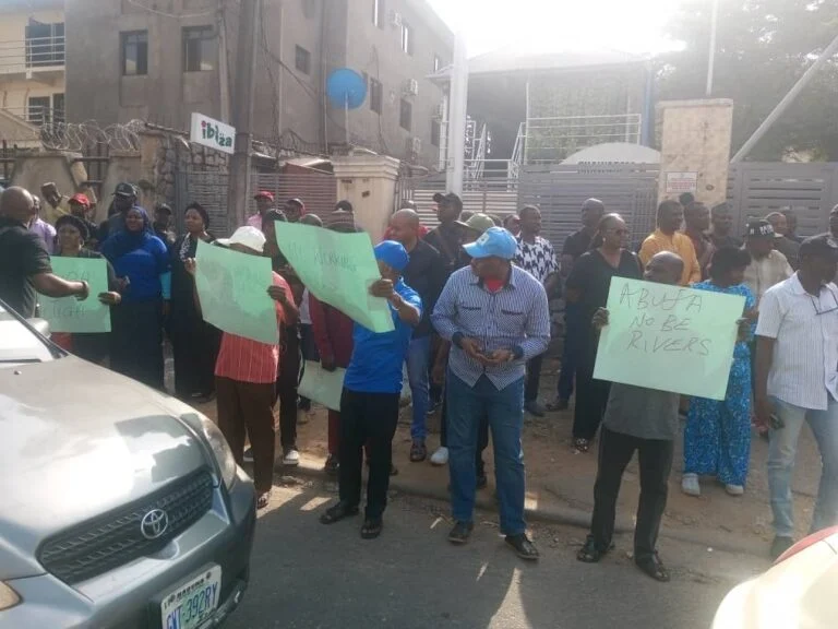 Wike must go, workers protest at industrial court in Abuja