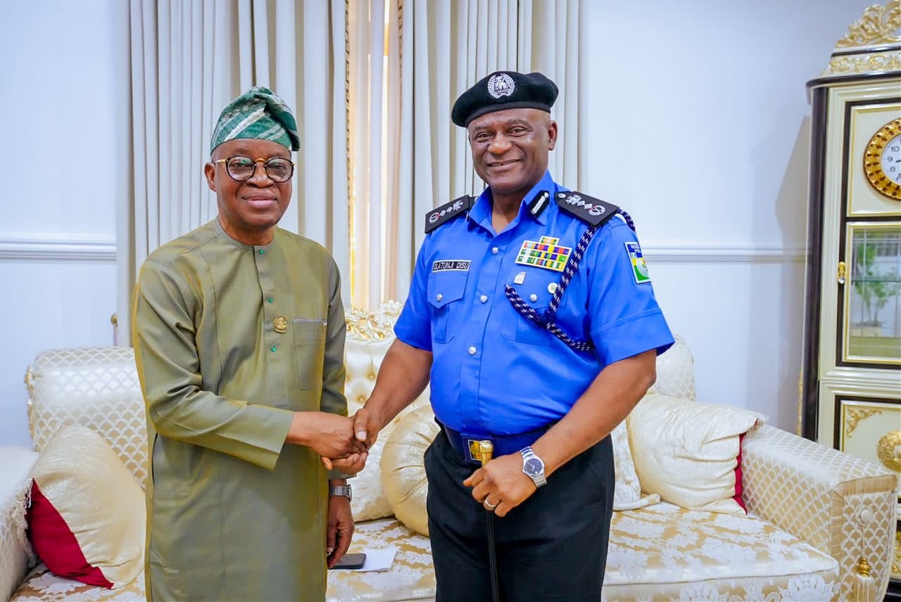 Oyetola Receives Newly Appointed IGP Tunji Disu in Abuja