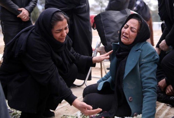 Mideast in Pictures: Iranians mourn families killed in U.S.-Israeli strikes, Tehran says more than 1,300 civilians dead